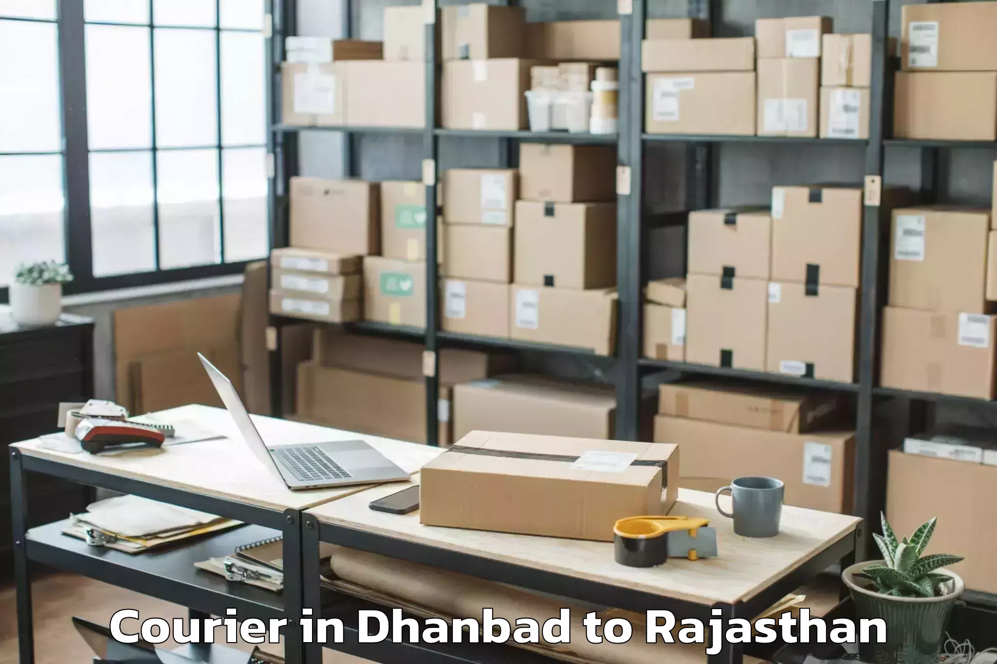 Easy Dhanbad to Jaisalmer Airport Jsa Courier Booking